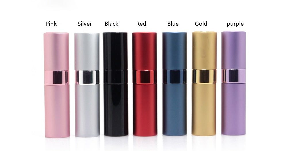 Compact refillable travel perfume atomizer with durable metal body and anodized aluminum nozzle in multiple colors