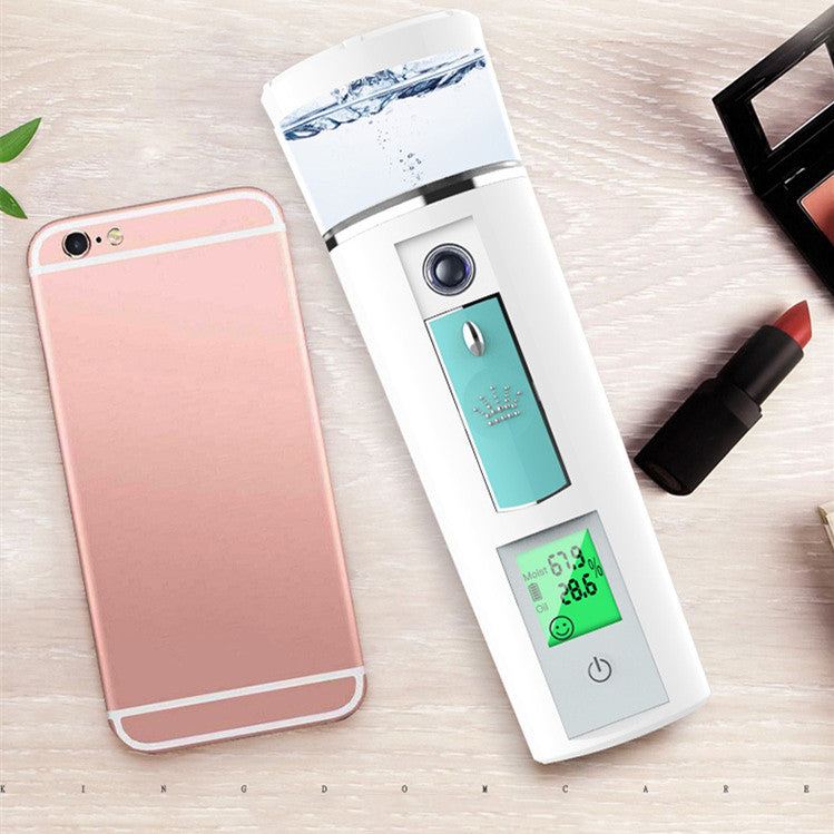 Compact rechargeable portable facial moisturizer emitting fine mist for skin hydration and travel use