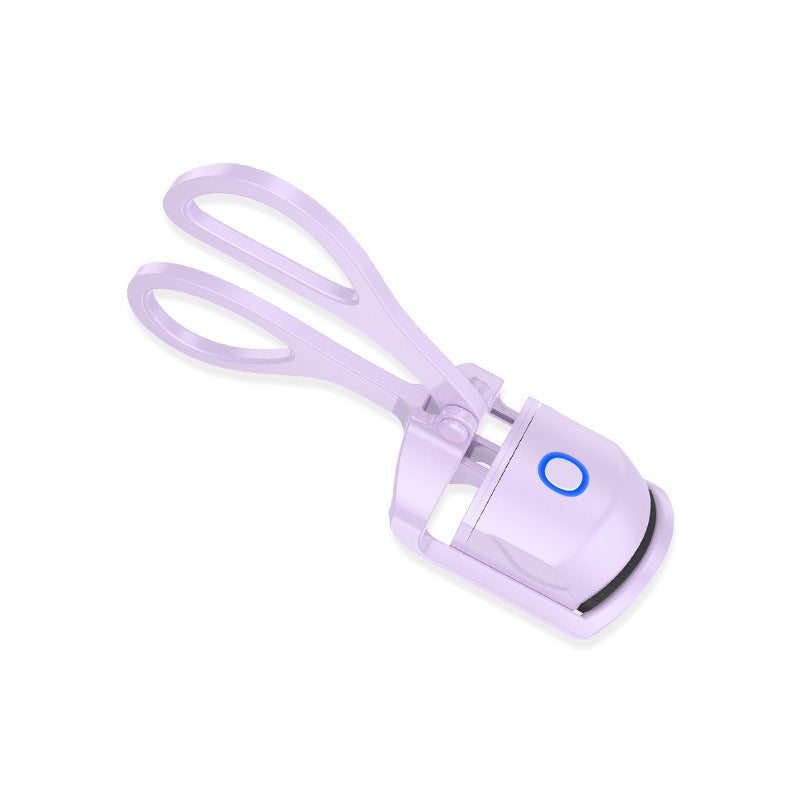 Heated electric eyelash curler with USB charging and silicone pad for natural curls