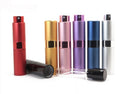 Compact refillable travel perfume atomizer with sleek metal body and anodized aluminum nozzle in multiple colors