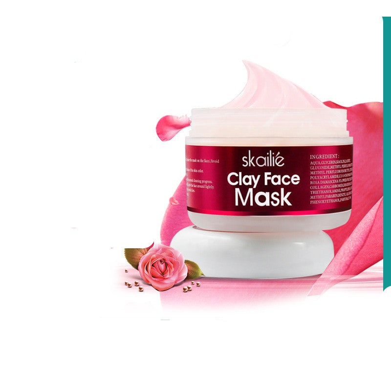 Rose Clay Face Mask smooth paste in jar with fresh rose petals and green leaves
