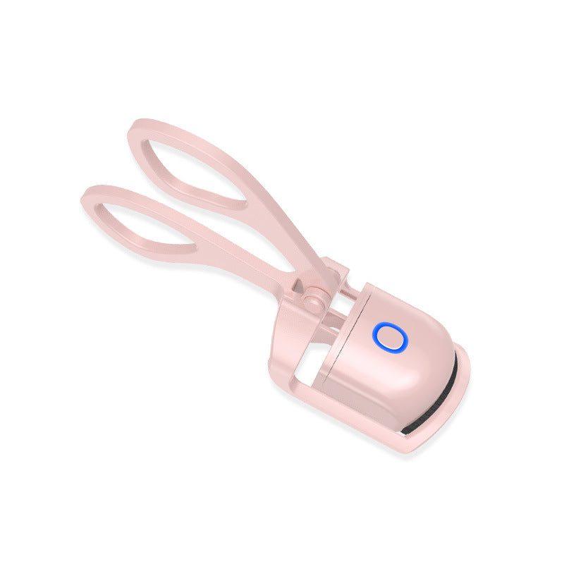 Heated electric eyelash curler with USB recharge, curved silicone pad, two temperature modes, and compact design for safe, natural lash curling